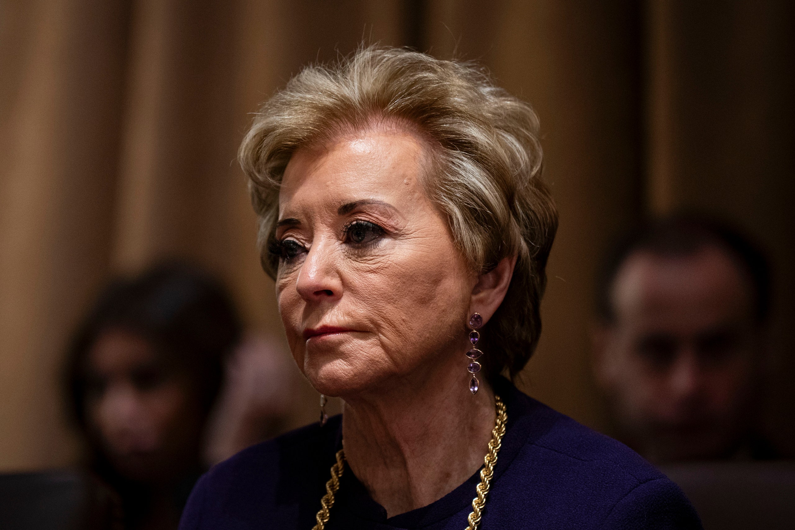 Departamento de Educación - Image may contain Linda McMahon Person Adult Accessories Jewelry Necklace Head Face Photography and Portrait
